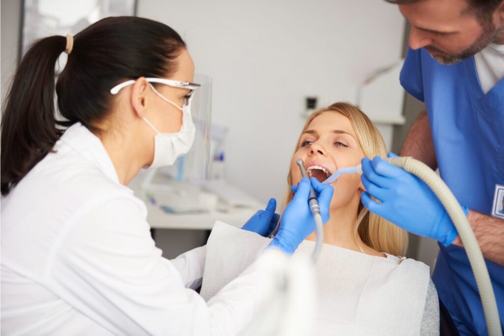 Dentist performing root canal treatment at Aesthetic Advanced Dental in Bangalore